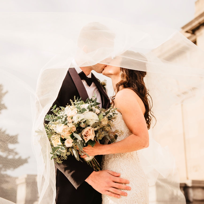 bride and groom with flowers