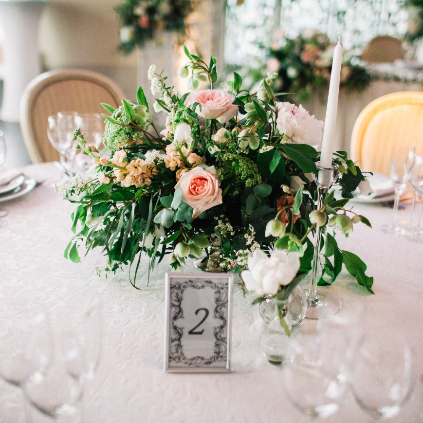 pink flowers on wedding table